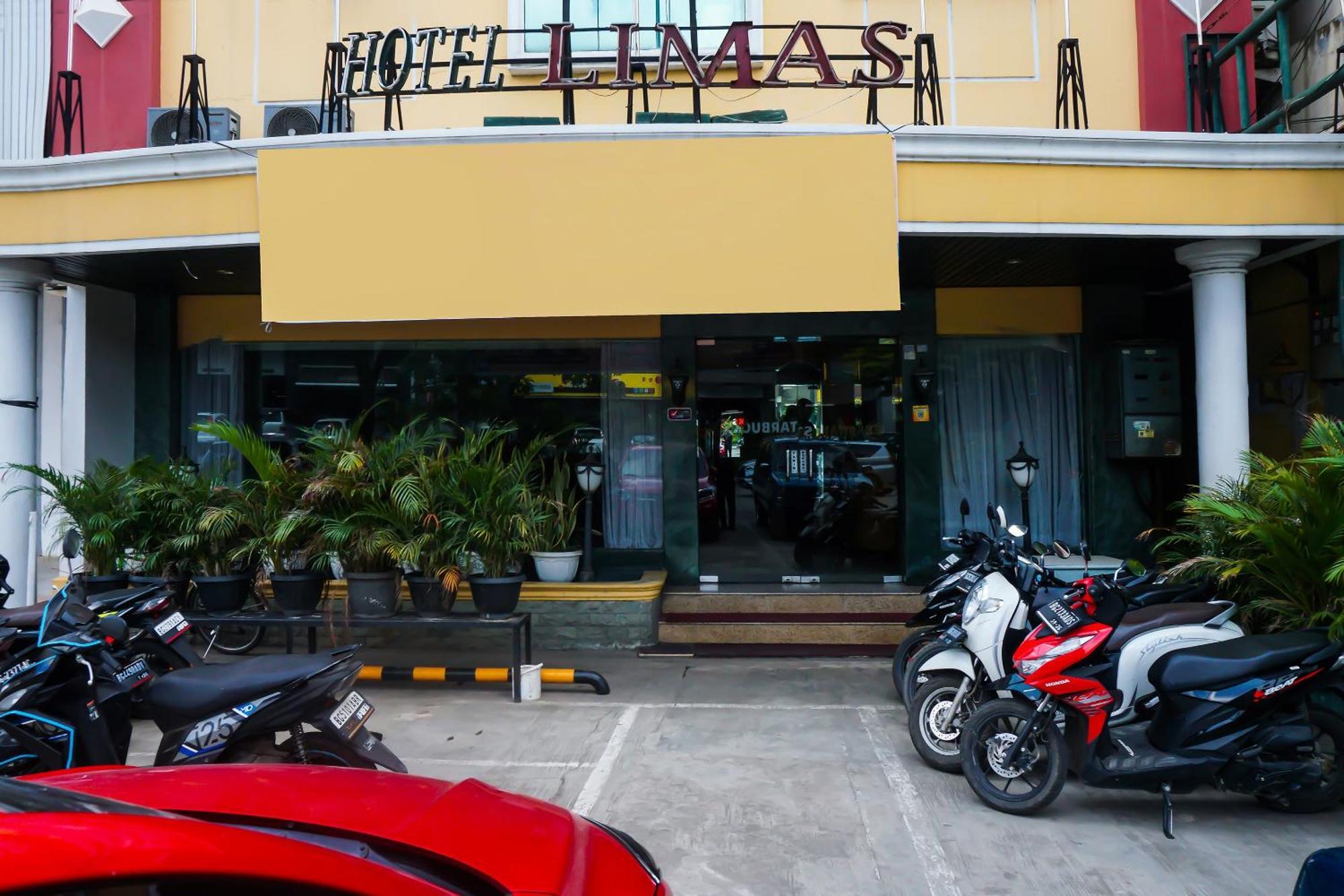 Super Oyo Collection O 92690 Hotel Limas Palembang Luaran gambar