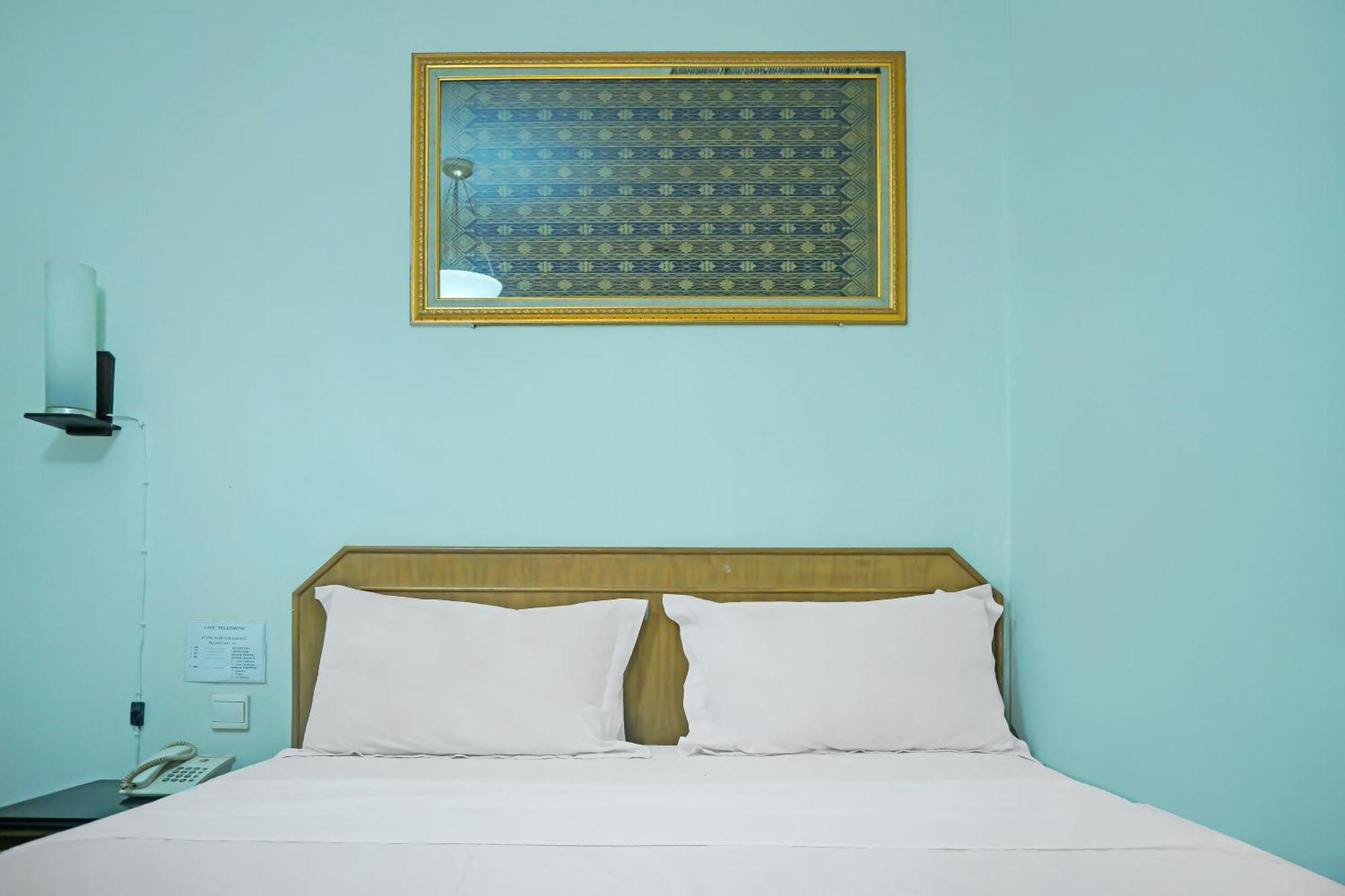 Super Oyo Collection O 92690 Hotel Limas Palembang Luaran gambar